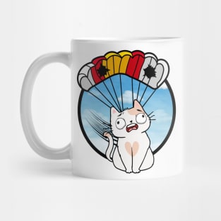 Silly white cat has a broken parachute Mug